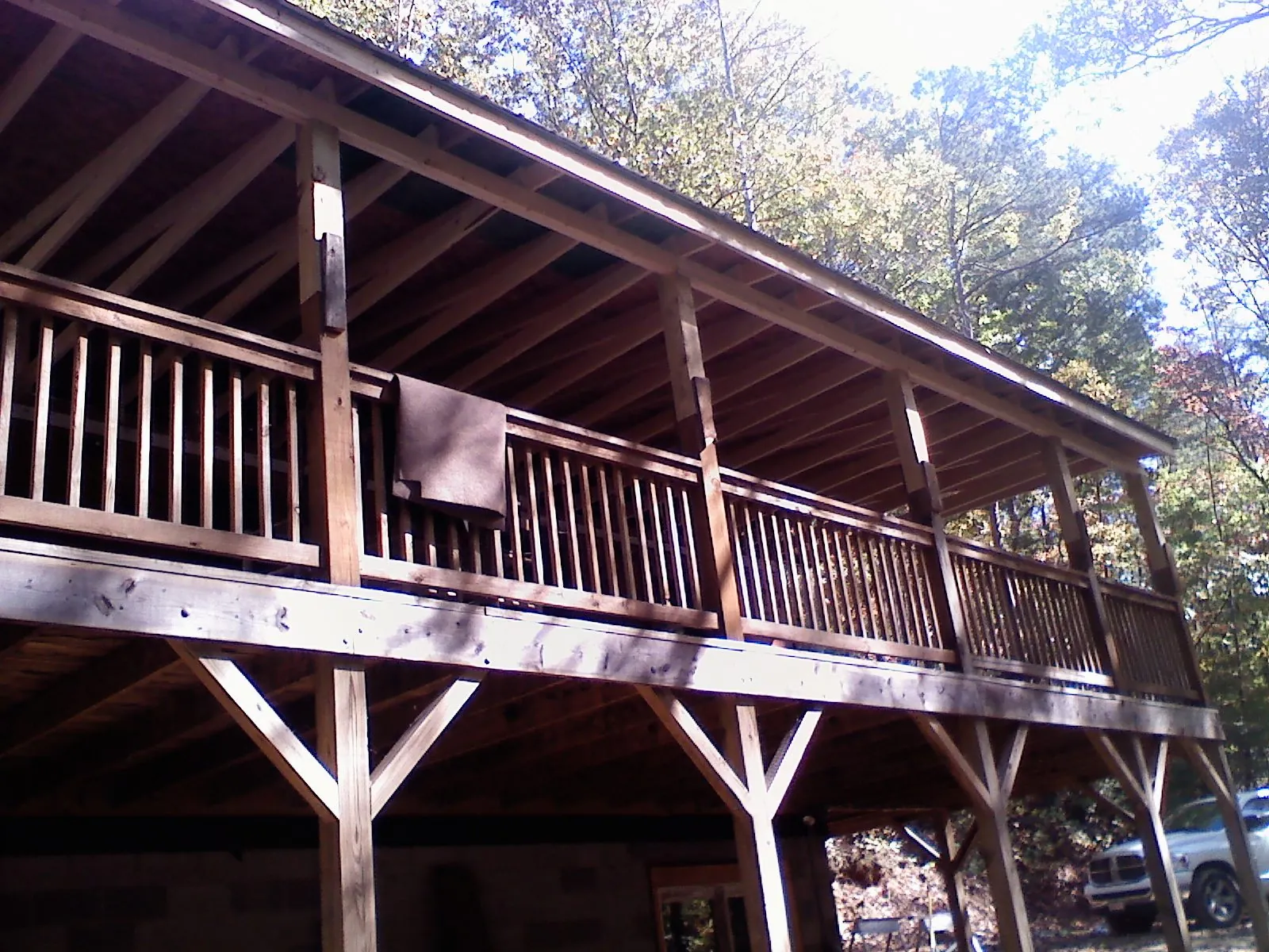 Timber framing under a new elevated porch and deck — Roof Leak Repair in Mabelvale by Roofing Brothers